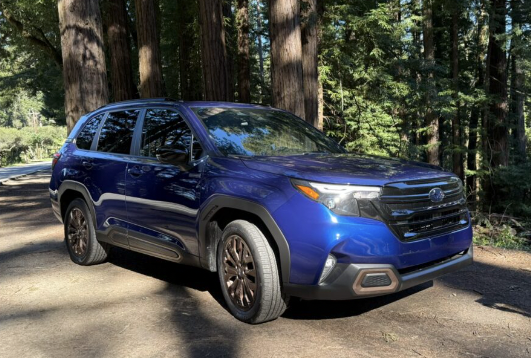 The Subaru Forester Hybrid Parked In Front Of California Redwoods